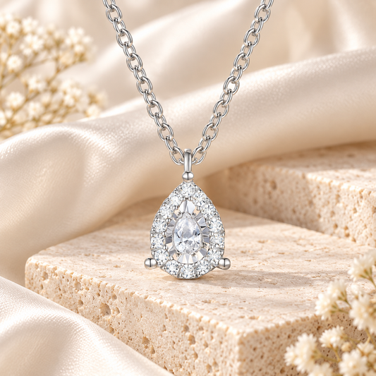 Sterling Silver 1/4 ct tw Diamond Miracle Plate Pear Shape Pendant with 18" Chain (I-I2)