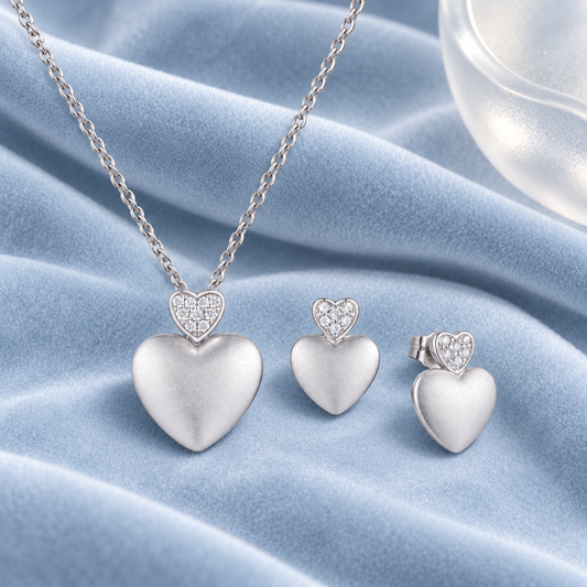 1/10 CT. T.W. Heart Shaped Multi-Diamond Pendant and Stud Earrings Set in Sterling Silver I - I2