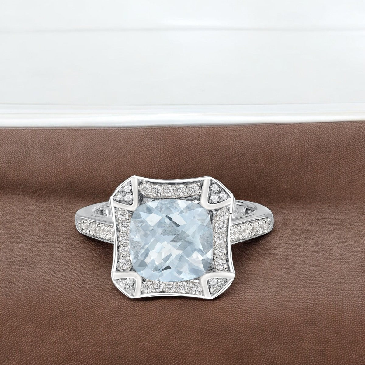 8.0mm Cushion-Cut Aquamarine and 1/4 CT. Diamond Frame Ring in Sterling Silver