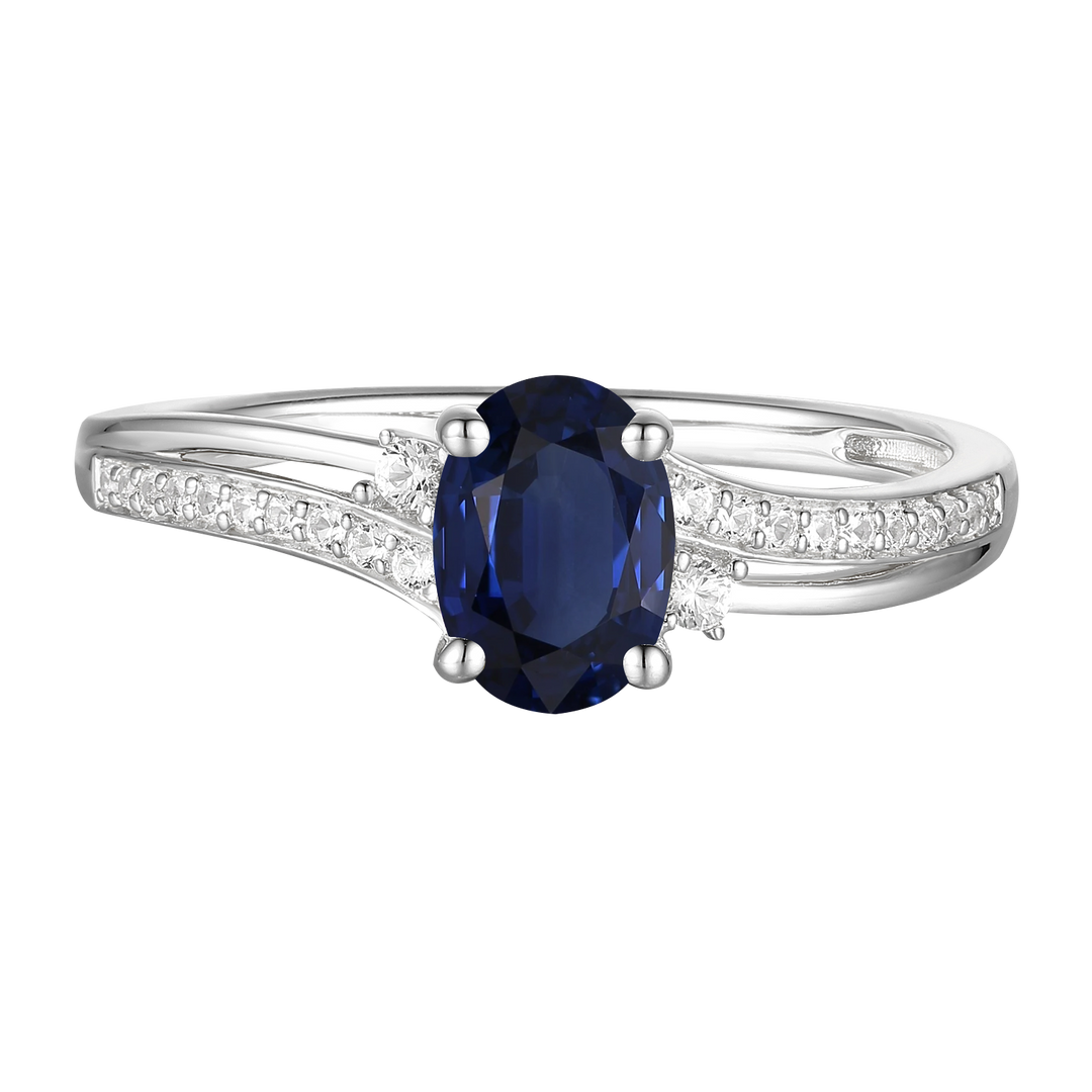 10K Genuine Sapphire & 1/10 ct tw Diamond Oval By-pass Ring