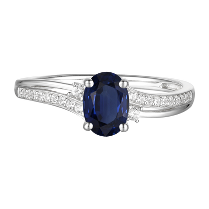 10K Genuine Sapphire & 1/10 ct tw Diamond Oval By-pass Ring
