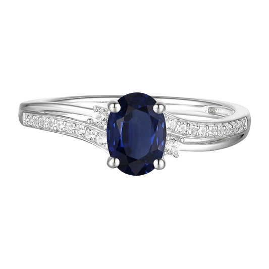 10K Genuine Sapphire & 1/10 ct tw Diamond Oval By-pass Ring