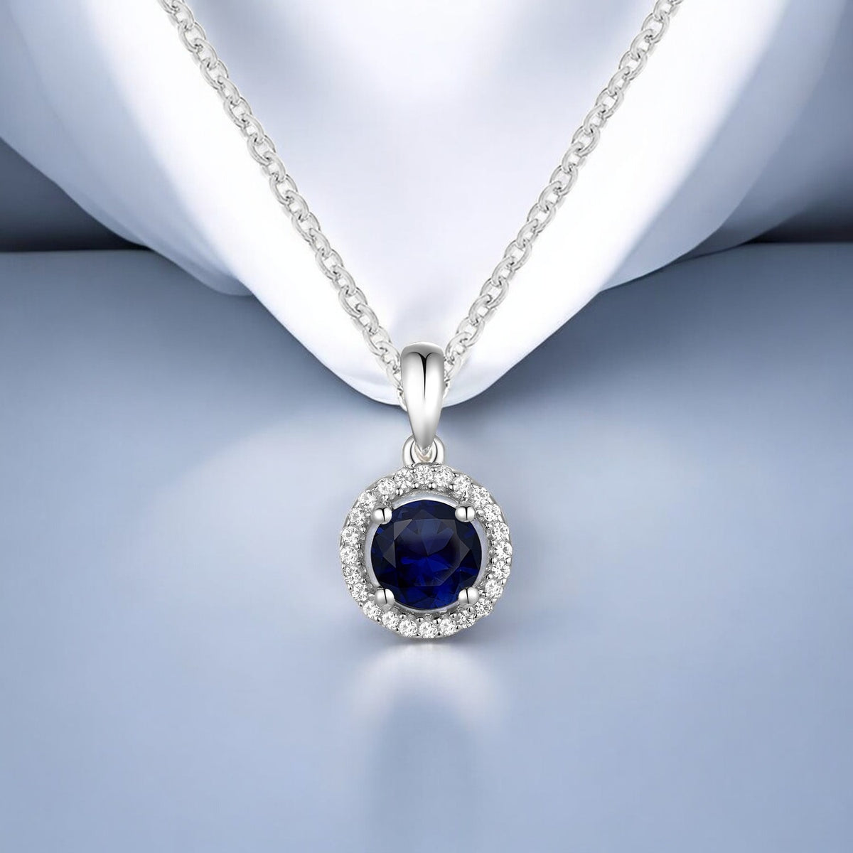 Elegant 10K White Gold Pendant with Genuine Sapphire and Diamonds – 5mm Stone, 18" Rope Chain
