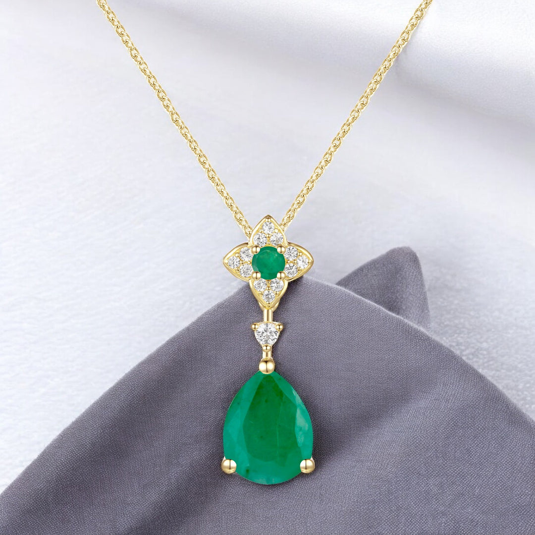 10K Genuine Emerald & 1/15 ct tw Diamond Pear Drop Pendant with 18" Chain