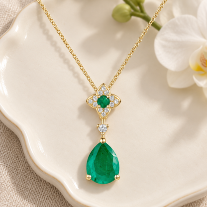 10K Genuine Emerald & 1/15 ct tw Diamond Pear Drop Pendant with 18" Chain